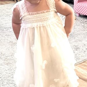 Adorable ivory 24 months chiffon dress with butterfly wings.